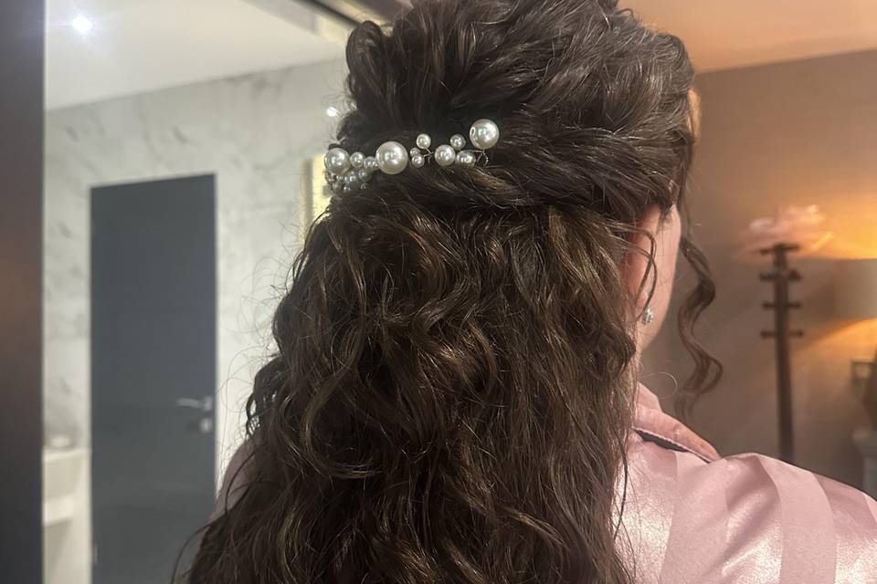 Natural curl half up style