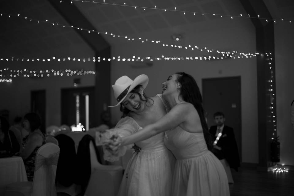Bride and Friend Dancing