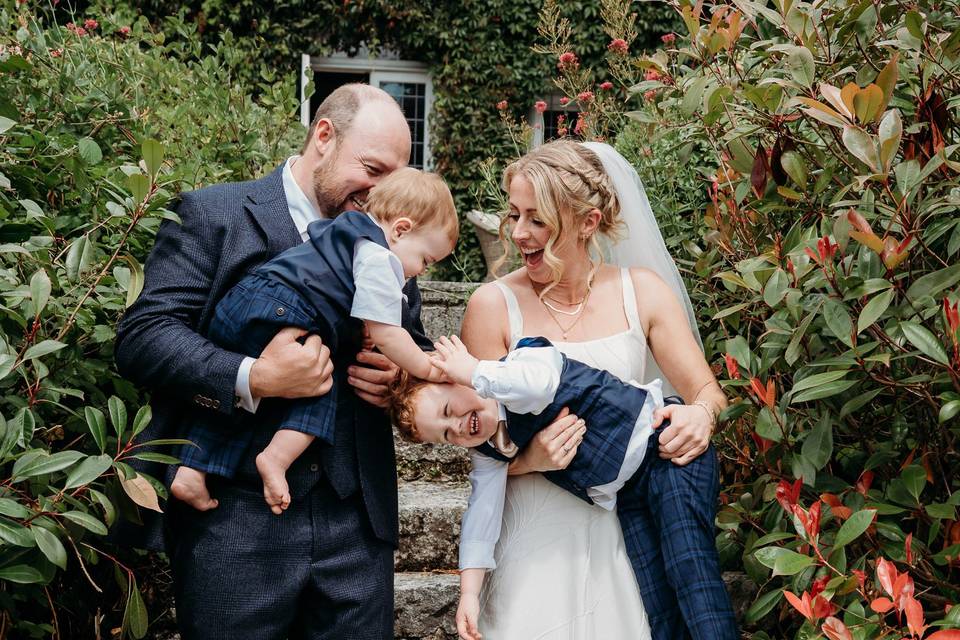 Family photo of bride and groo