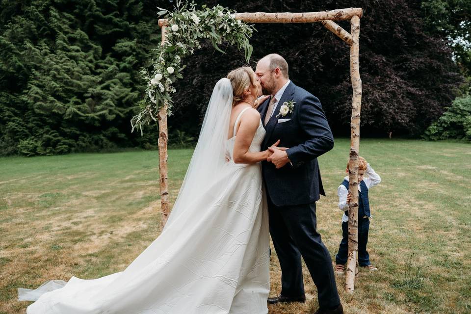 Kissing bride and groom