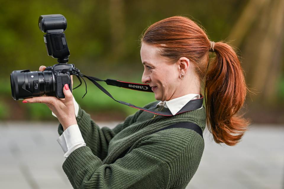 Photographer With Lens