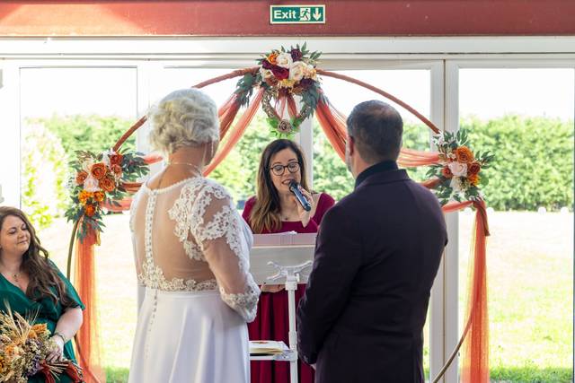 bride and groom at altar