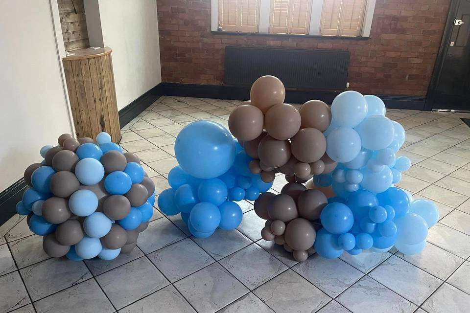 Blue and grey balloon arch