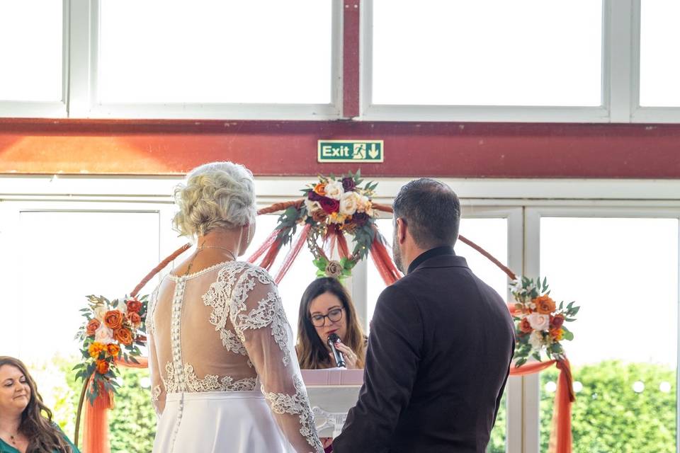 bride and groom exchanging vows