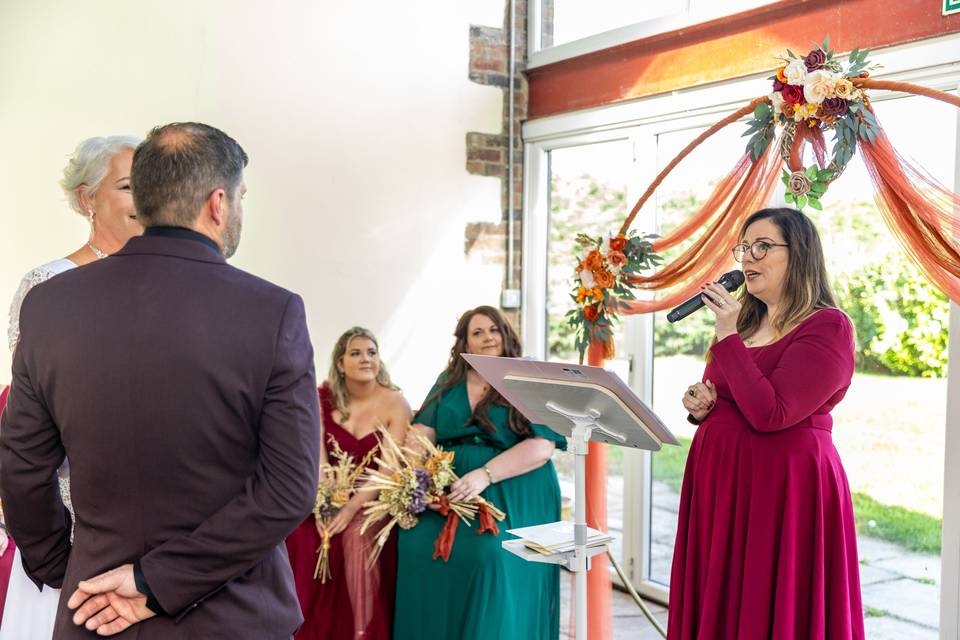 groom standing at front of ceremony