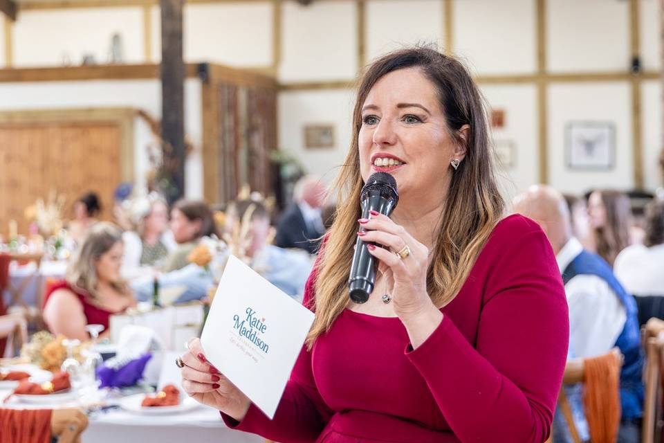 woman speaking at wedding breakfast
