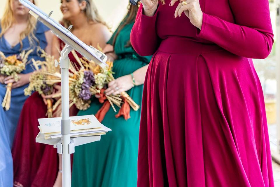 woman speaking at wedding podium