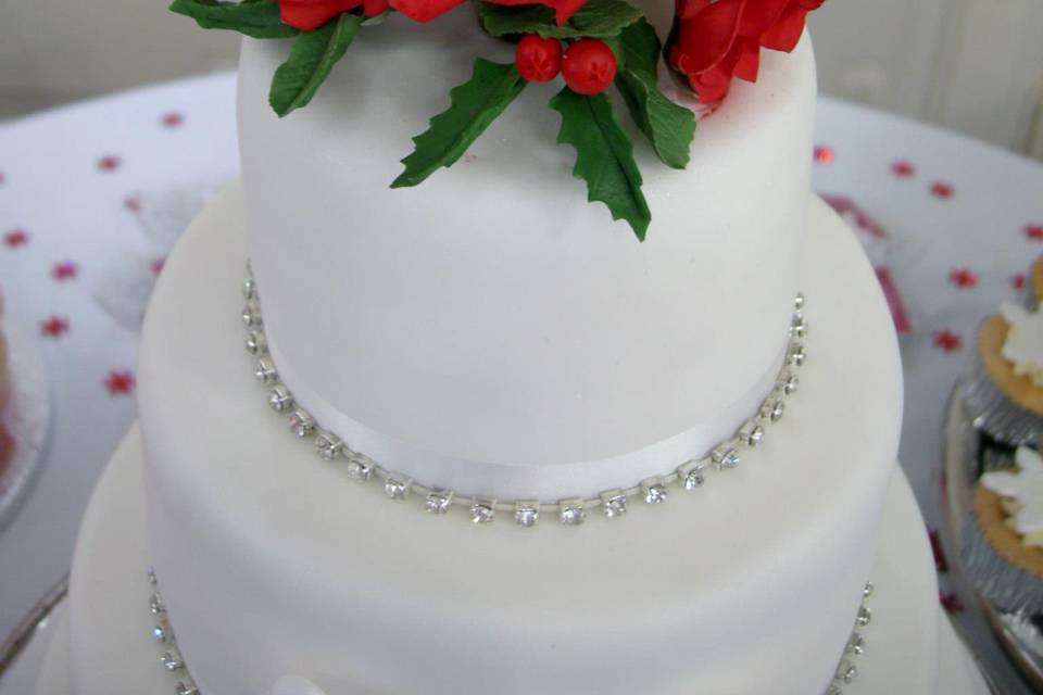 Handmade red roses and holly