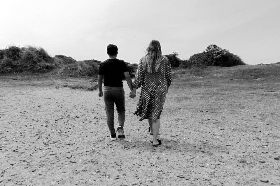 Holding hands at the beach