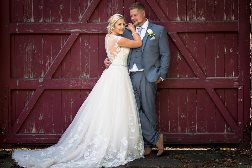 Posing in front of barn door