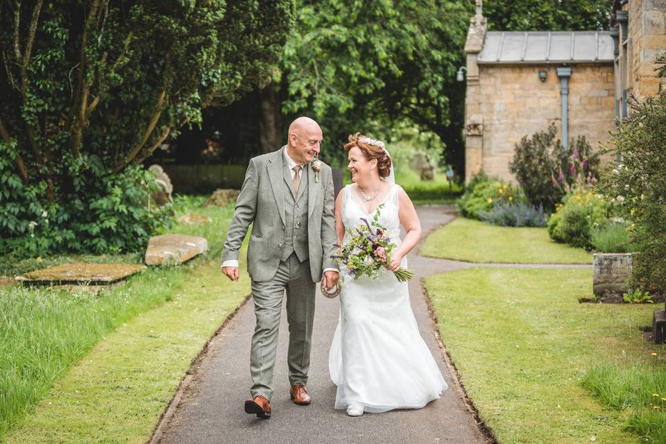 Holding hands and walking on a path