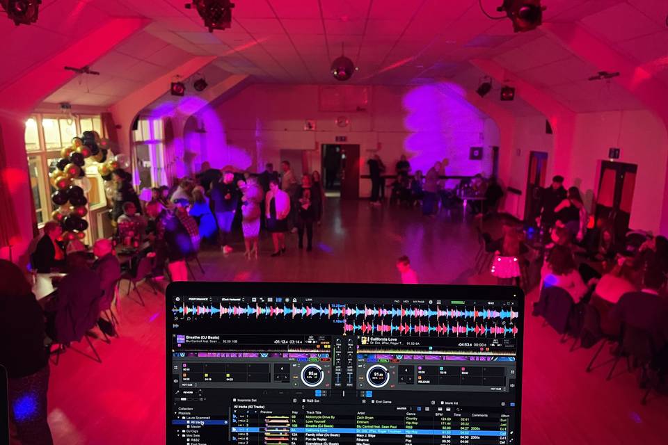 Behind the DJ