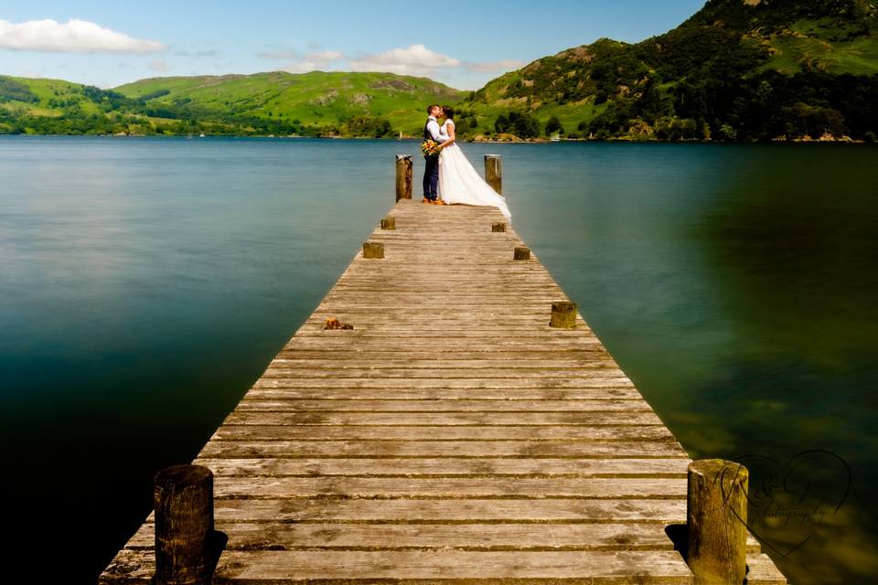 Bride and groom on the pier