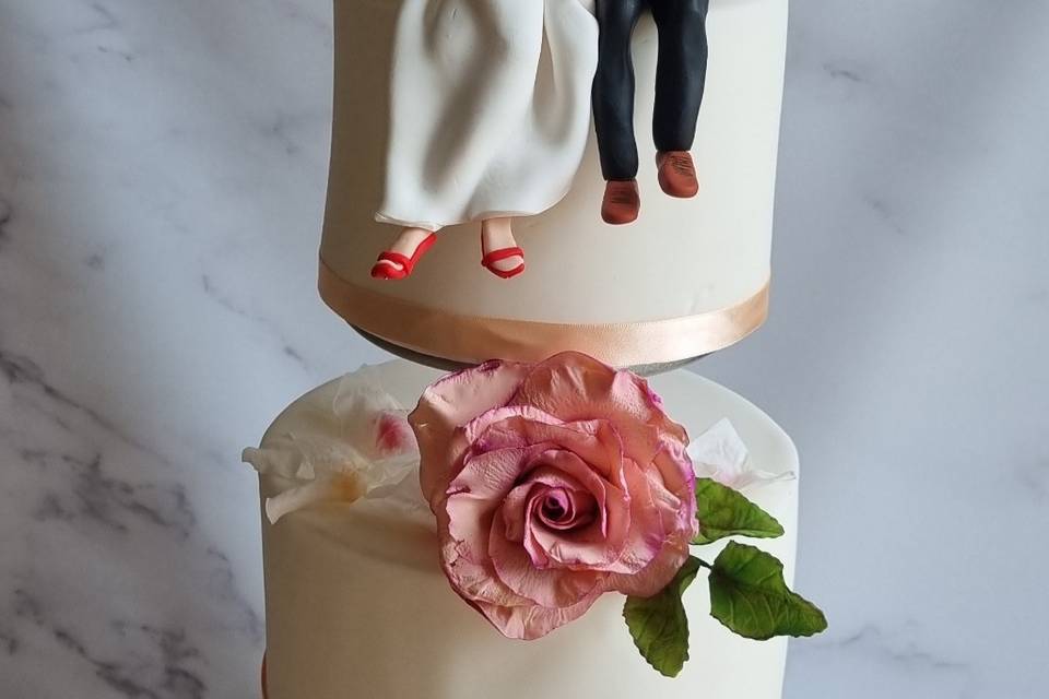Bride and groom sitting down.