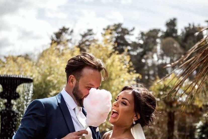 Newlyweds enjoying the candy floss