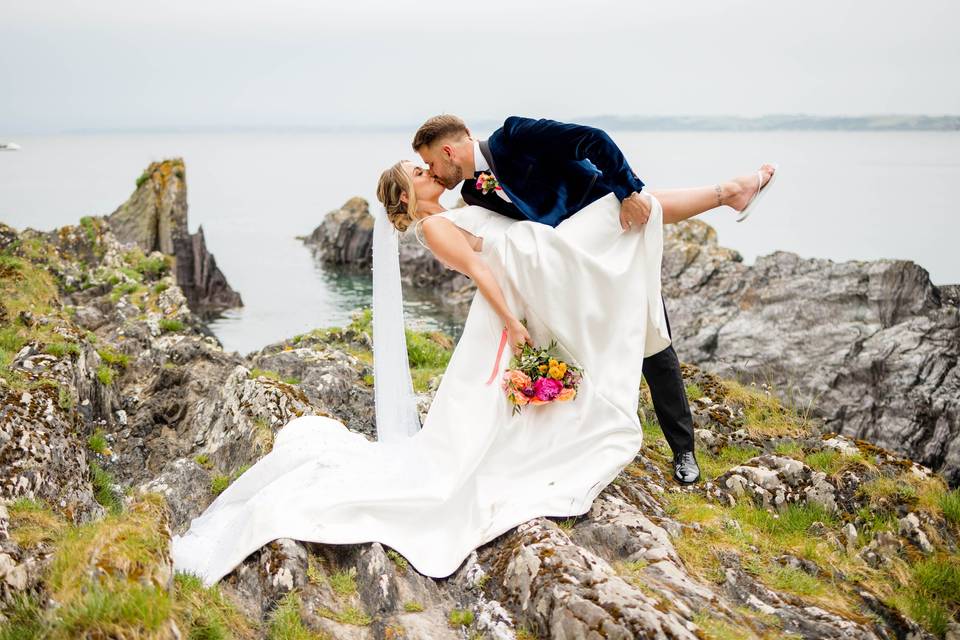 Wedding dip on the rocks