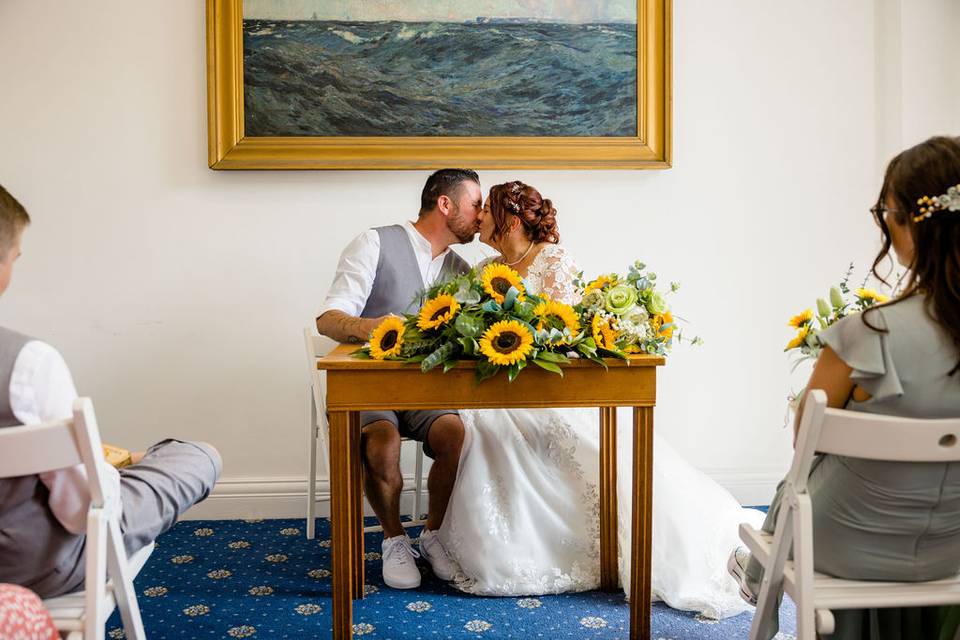 Signing the register kiss