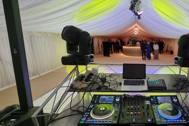 DJ setup beneath the marquee