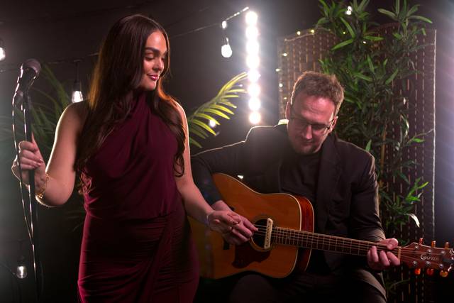 Performing with live guitar