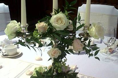 Candelabra with rose garland