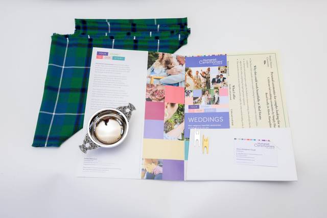 Brochure sitting on tartan cloth