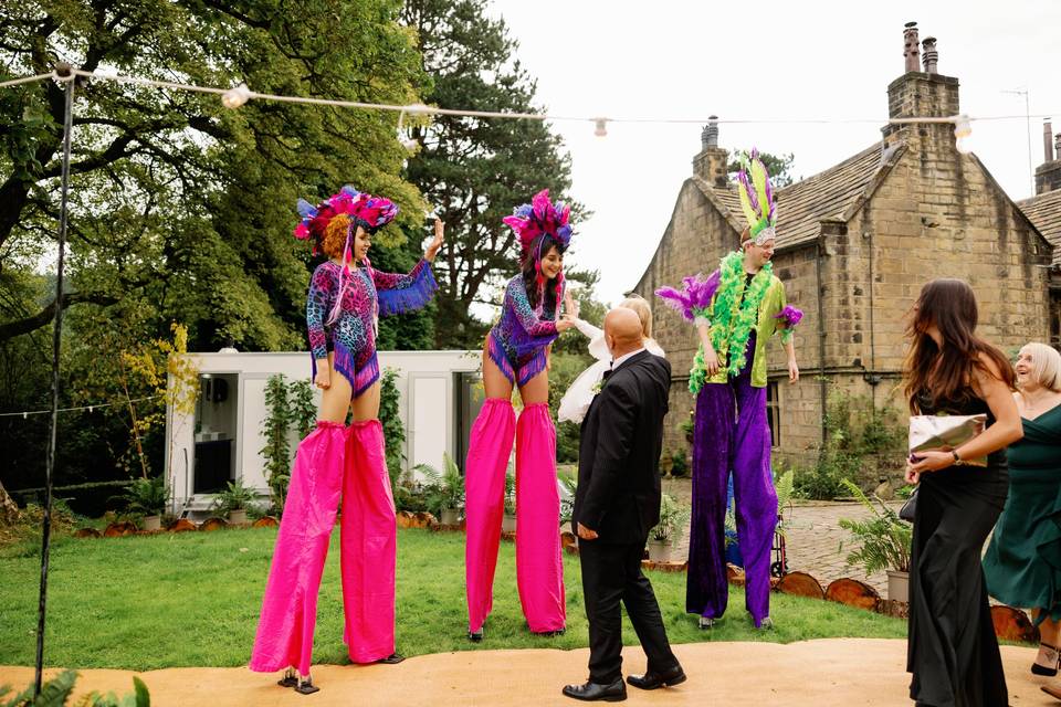 Wedding stilt walkers