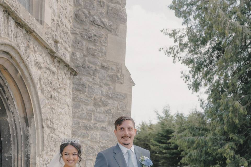 Couple outside church walking