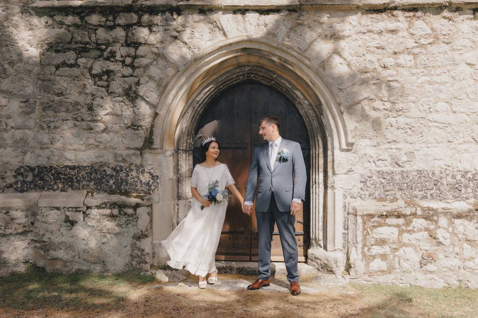 Couple outside church door