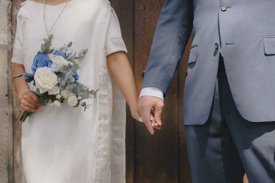 Couple holding hands church