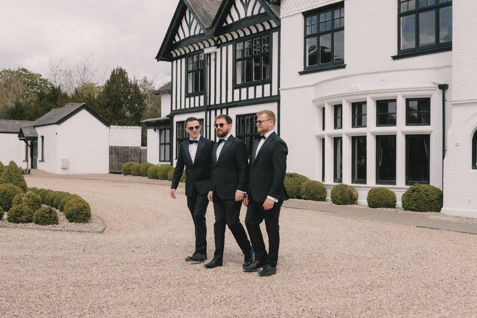 Groomsmen standing at venue
