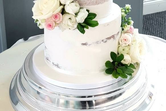 Semi-naked white 3 tier floral on cake