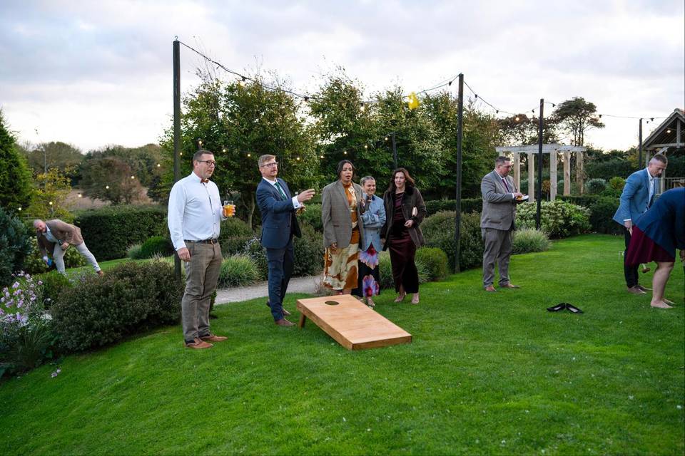 Guests playing cornhole