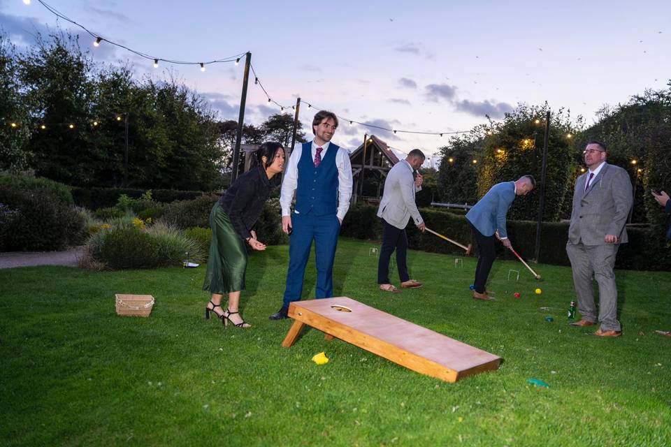 Guests playing cornhole