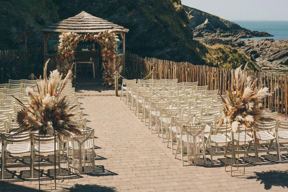 Outdoor beach ceremony styling