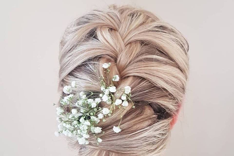 Intricate updo with hair florals