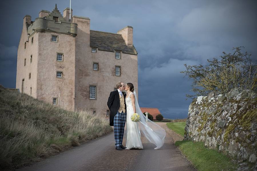 Newlyweds kissing