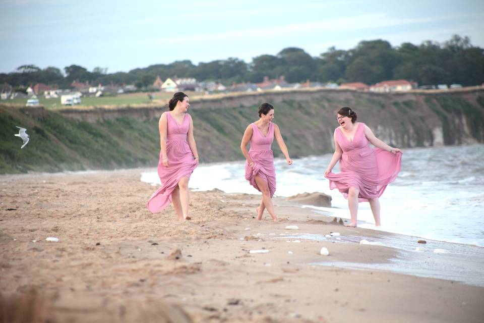 Bridesmaids on a beach