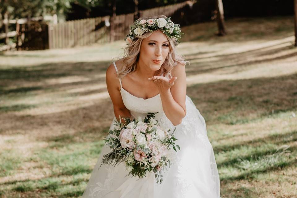 Bride blowing a kiss