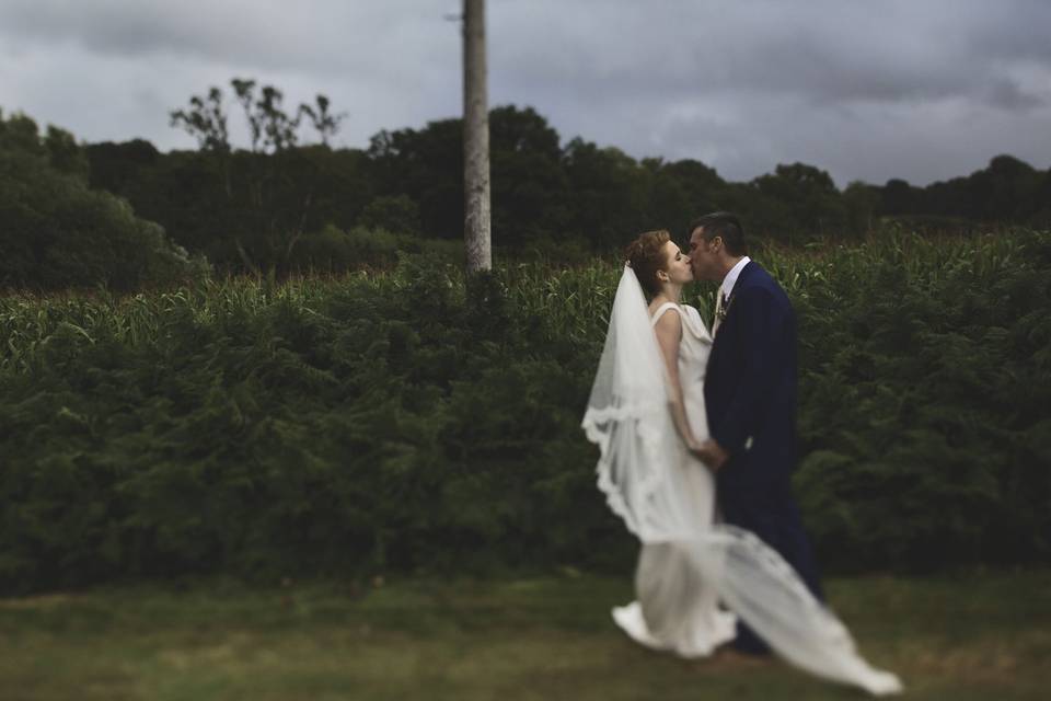 Newlyweds kissing