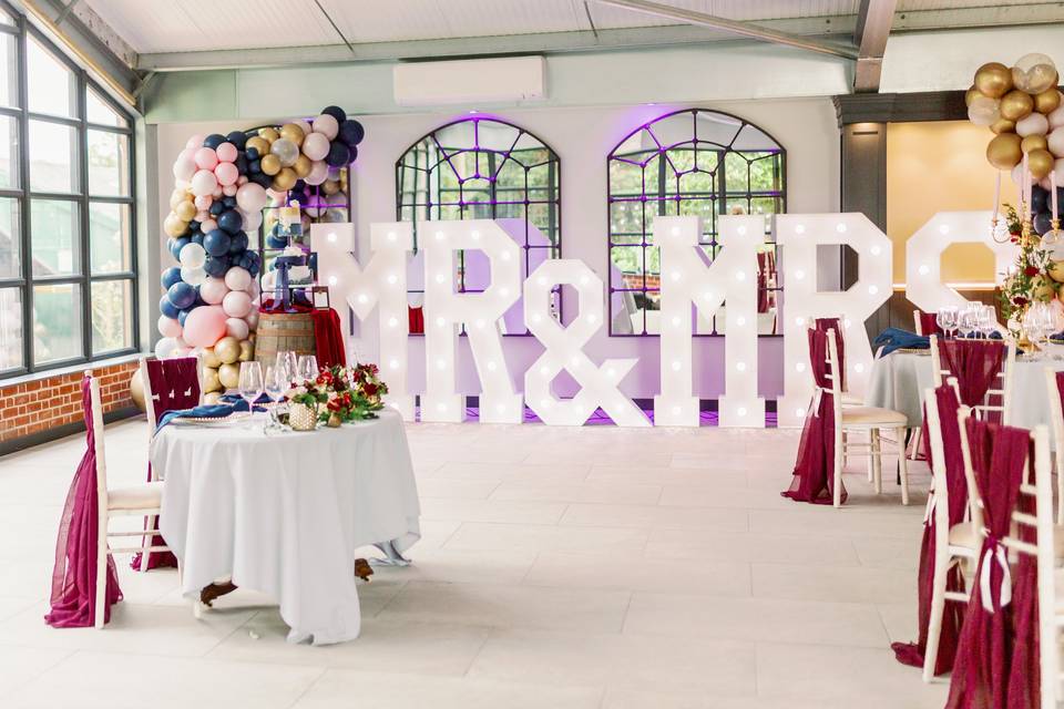 Mr & mrs with balloons