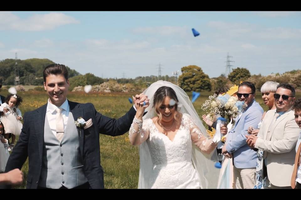 Holding hands down the aisle