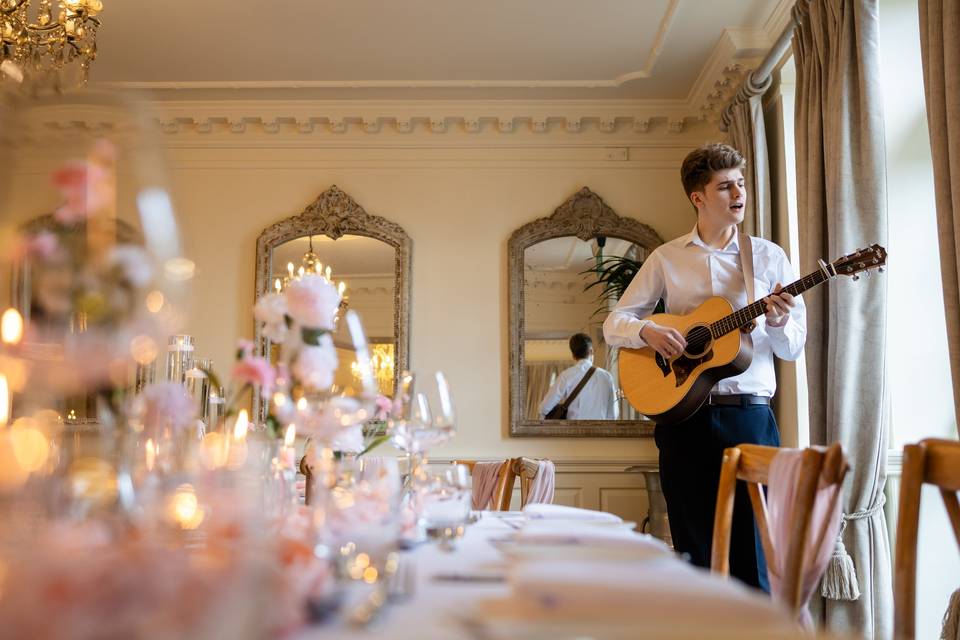 Oscar performing acoustically