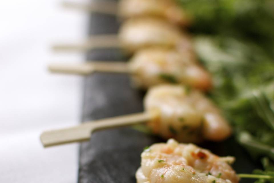 Our garlic prawn skewers  will put a smile on your face