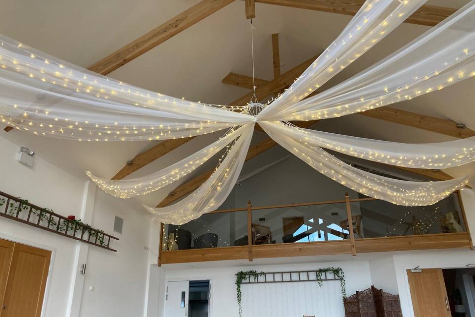 Fairy lights and voile drapes