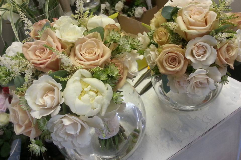 Fresh ivory peonies and roses