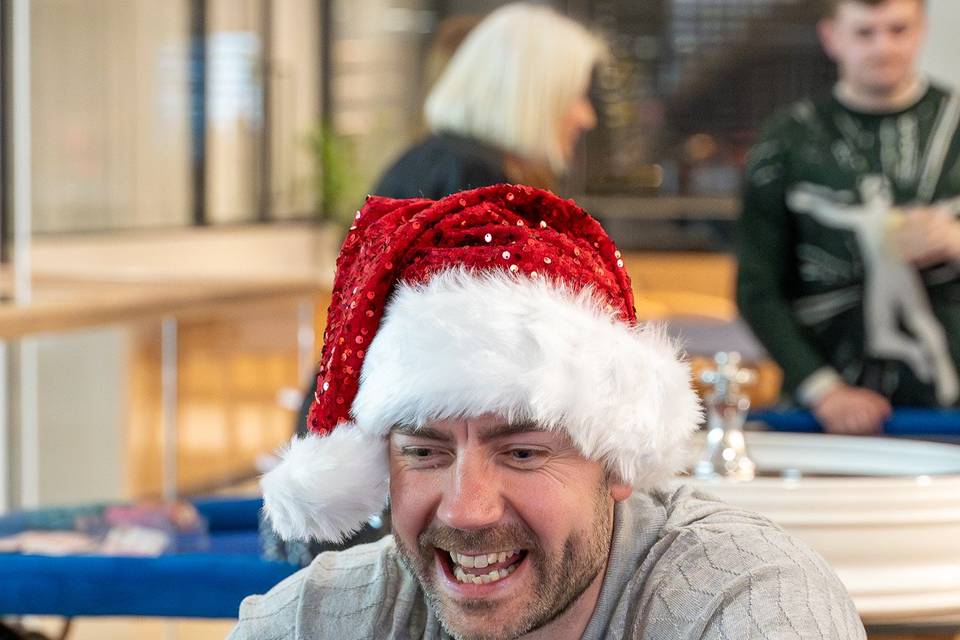 Santa hat, big casino smile