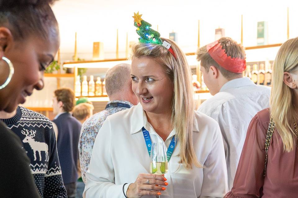 Guests laughing over blackjack