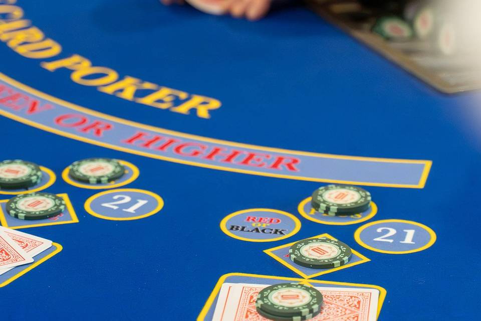 Croupier dealing poker cards