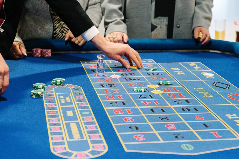 Croupier settles roulette chip