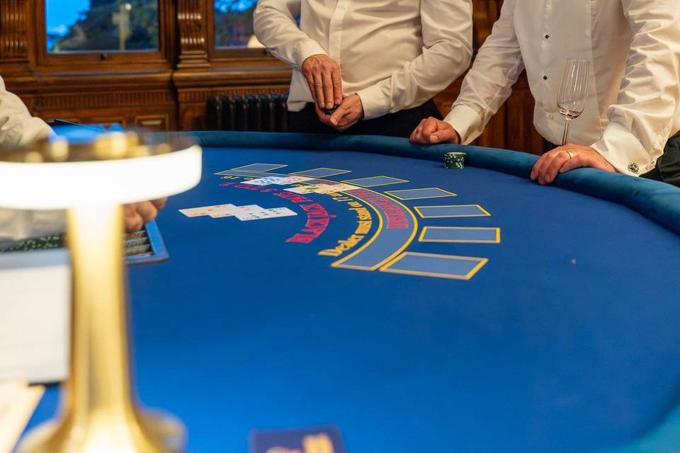 Suited guests enjoy blackjack